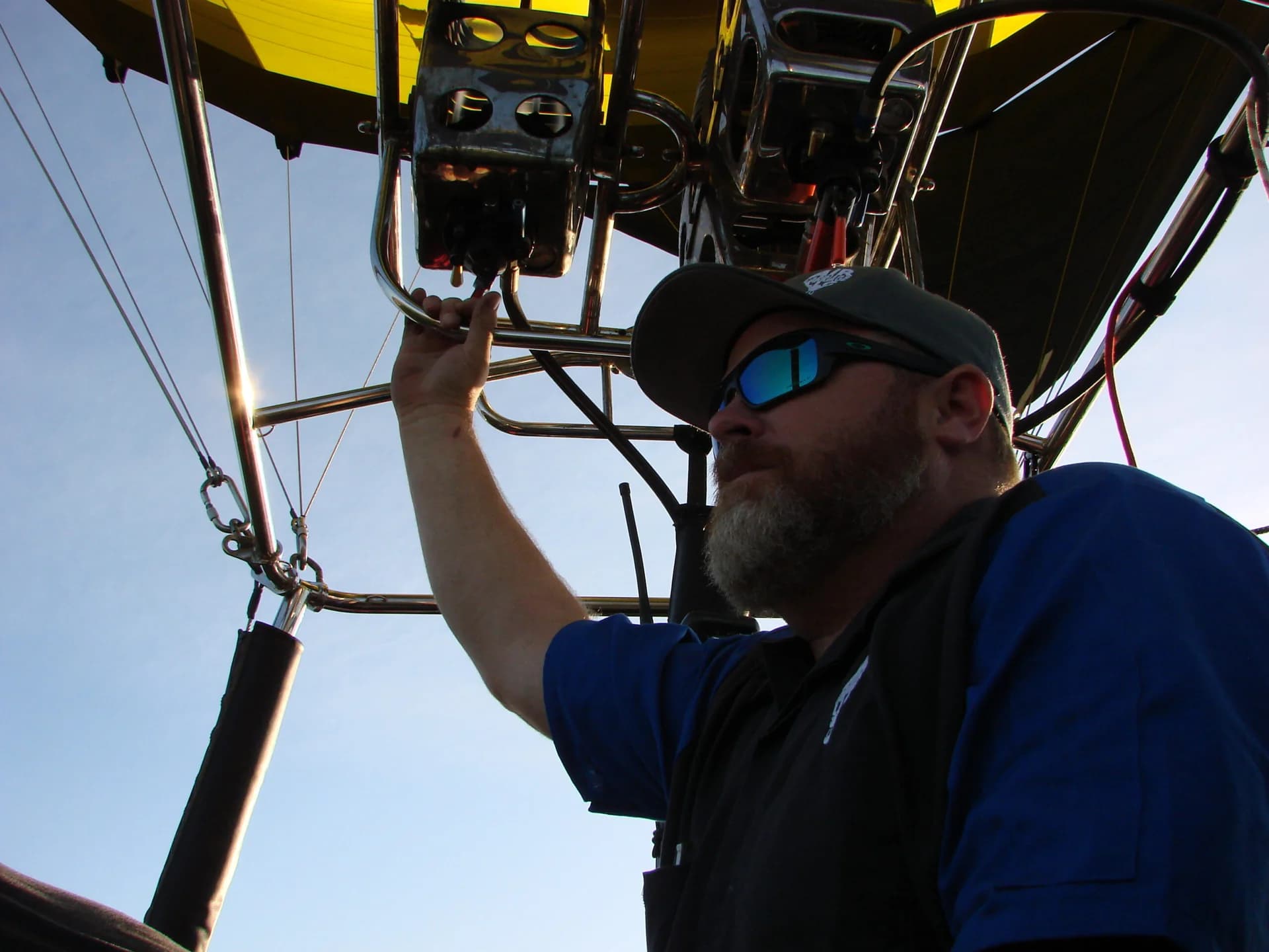 Pilot Art Moller operating the burners beneath a hot-air balloon