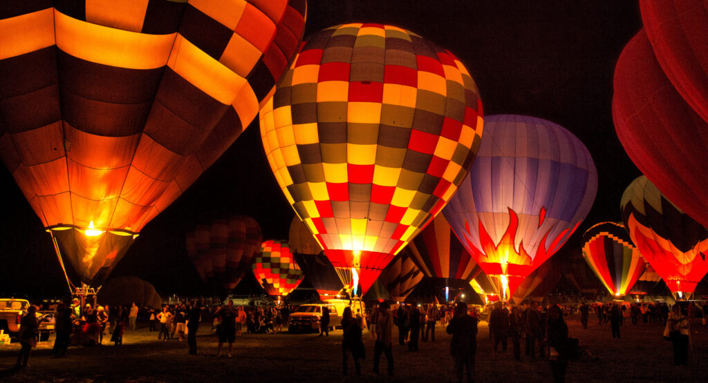 Hot air balloon ride cancellation policy in Albuquerque during night glow event